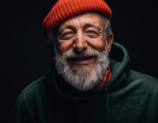 close up of homeless man smiling