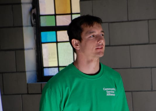close up of a gentleman volunteering for Community Service Alliance